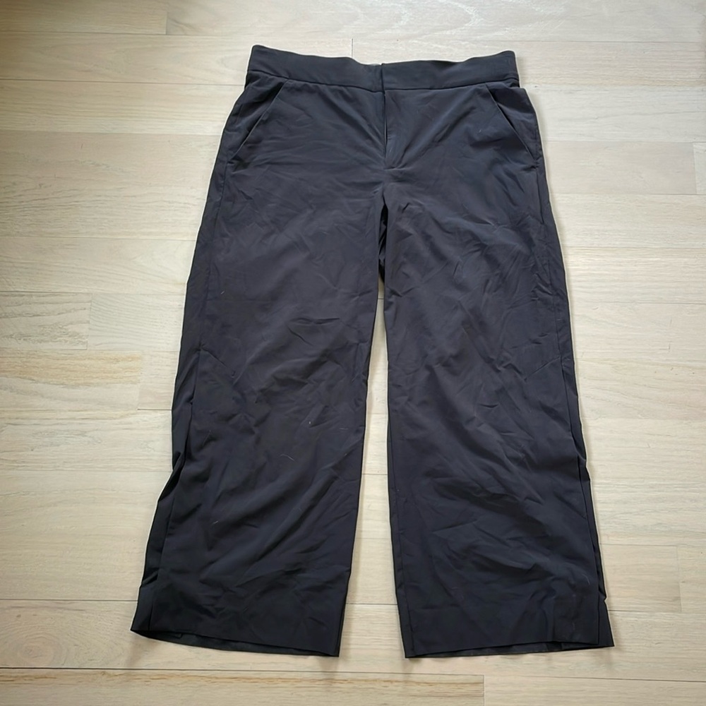 Athleta black athleisure, cropped, wideleg trouser with snap detail
